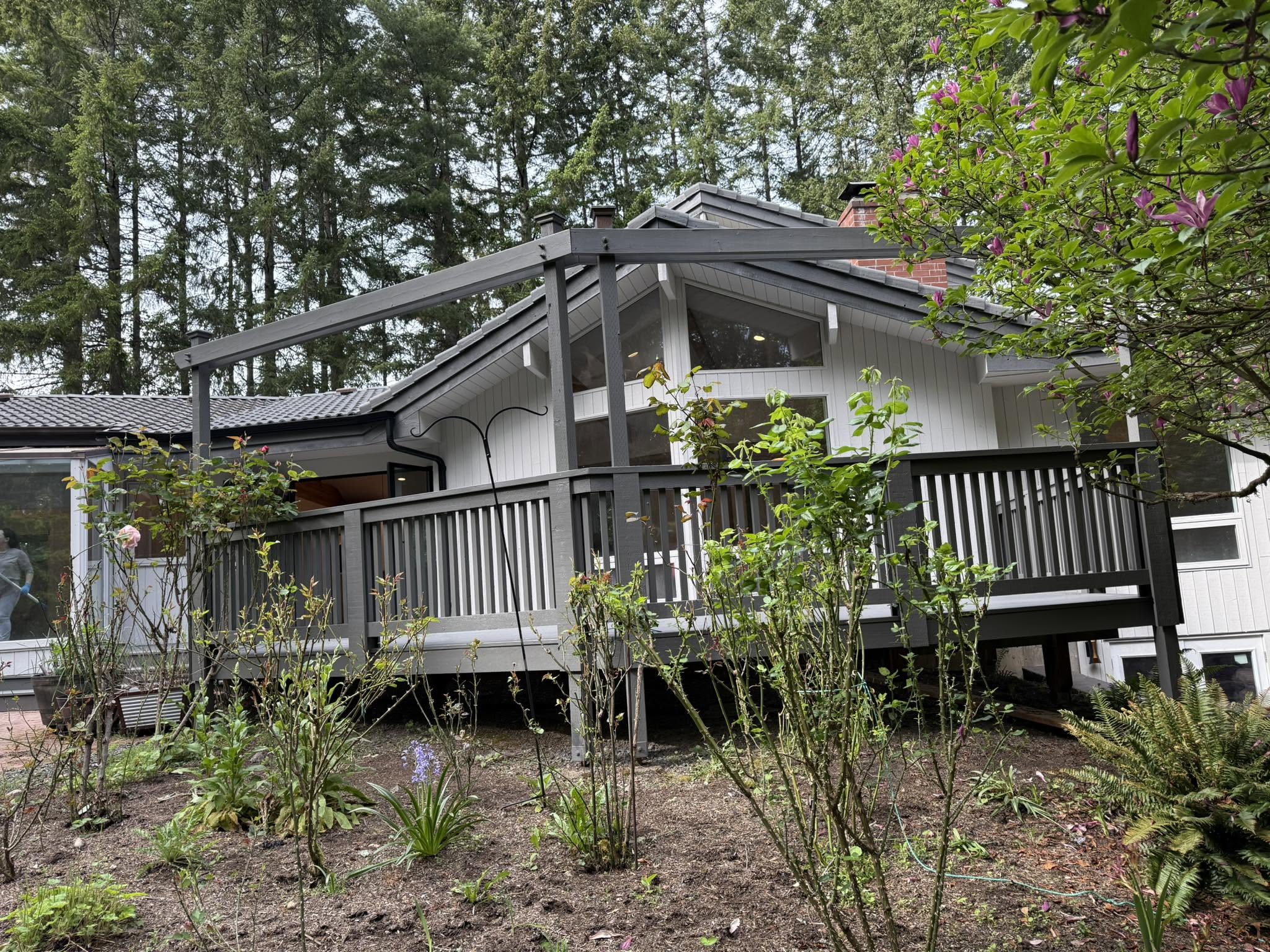 White exterior siding and charcoal deck railing painting in King County WA