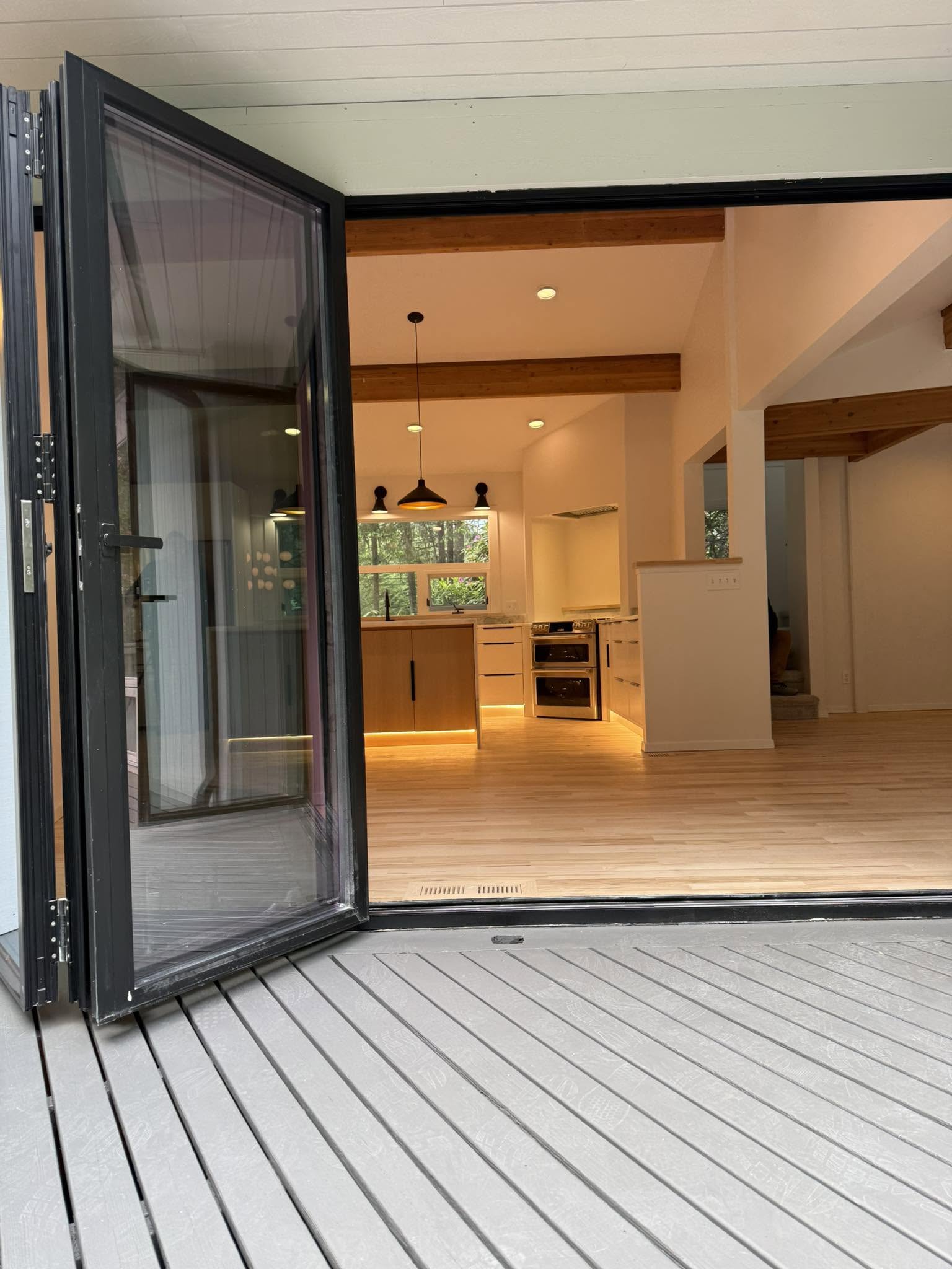 Interior painting and grey deck staining looking into a modern Kent WA kitchen